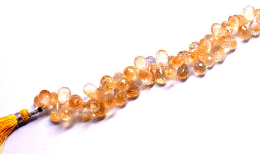 A 12-inch strand of natural Citrine drops, faceted for extra shine, ideal for creating radiant jewelry pieces with a warm, golden hue.
#Citrine #FacetedBeads #GemstoneJewelry #CitrineJewelry #BeadedDesigns #HandmadeJewelry #GoldenGlow #JewelryMaking #CustomJewelry #NaturalGems