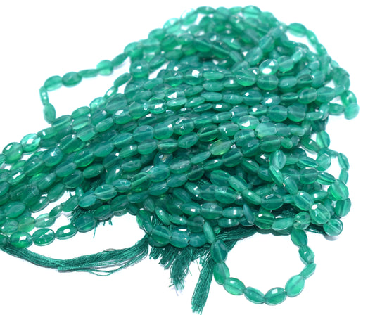 A 13-inch strand of natural Green Onyx oval faceted beads, offering a sleek and polished design, perfect for crafting elegant and sophisticated jewelry pieces.
#GreenOnyx #OvalBeads #FacetedBeads #GemstoneJewelry #BeadedJewelry #JewelryMaking #NaturalGemstones #CustomJewelry #ElegantDesigns #VibrantGreen