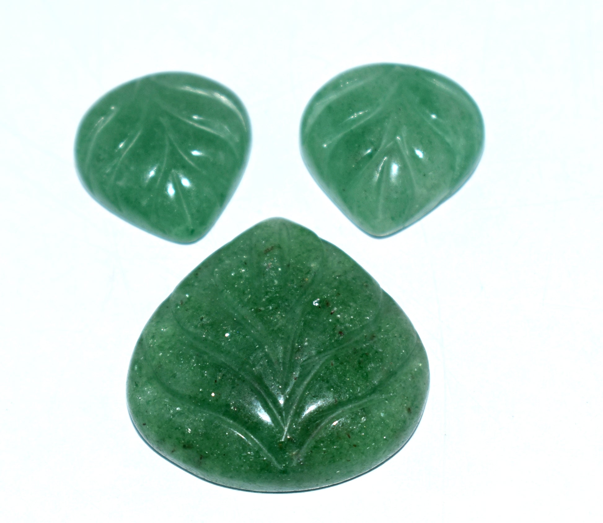 A beautifully carved natural Green Aventurine gemstone, weighing 68.50 carats, perfect for creating custom jewelry pieces.
#GreenAventurine #CarvedGemstones #JewelryMaking #GemstoneCarving #NaturalGemstones #HandmadeJewelry #LuxuryJewelry #StatementPieces #CustomJewelry #UniqueDesigns