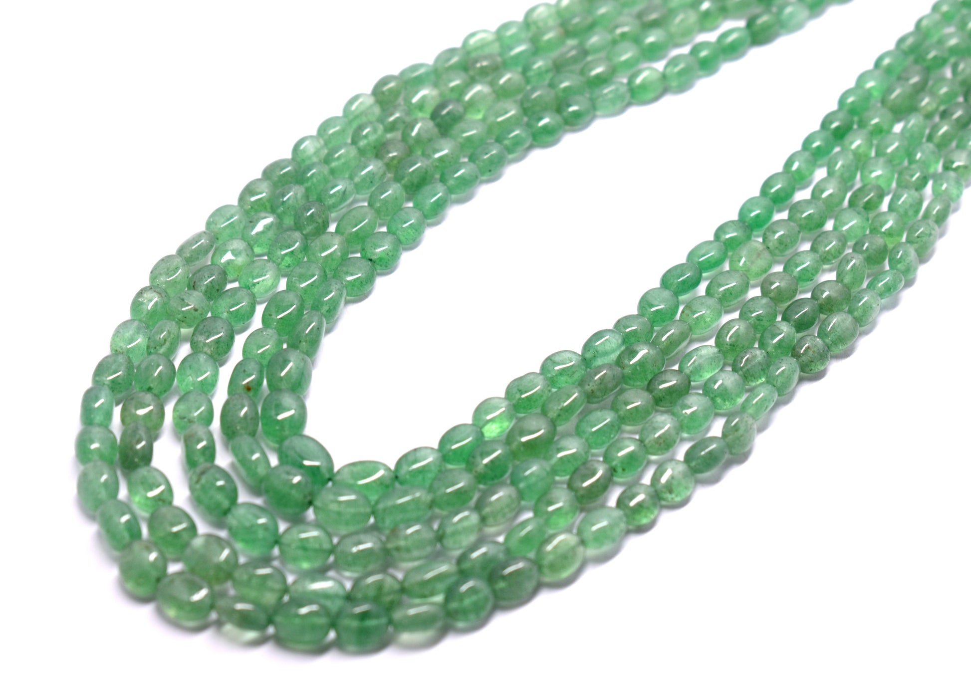 A vibrant 5-line bunch necklace featuring Green Aventurine mani beads, weighing 715 carats.
#GreenAventurine #ManiBeads #GemstoneJewelry #LuxuryJewelry #StatementNecklace #NaturalGemstones #ChicJewelry #ElegantStyle #BeadedNecklace