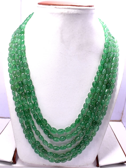 A vibrant 5-line bunch necklace featuring Green Aventurine mani beads, weighing 715 carats.
#GreenAventurine #ManiBeads #GemstoneJewelry #LuxuryJewelry #StatementNecklace #NaturalGemstones #ChicJewelry #ElegantStyle #BeadedNecklace