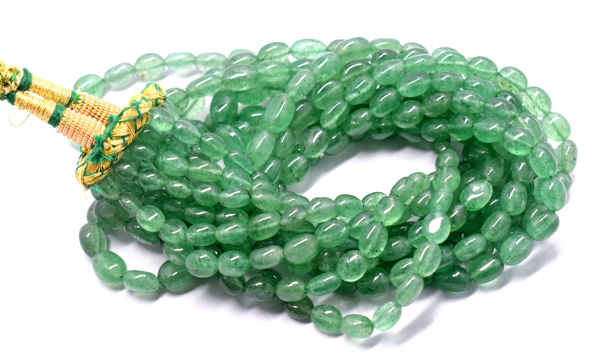 A vibrant 5-line bunch necklace featuring Green Aventurine mani beads, weighing 715 carats.
#GreenAventurine #ManiBeads #GemstoneJewelry #LuxuryJewelry #StatementNecklace #NaturalGemstones #ChicJewelry #ElegantStyle #BeadedNecklace