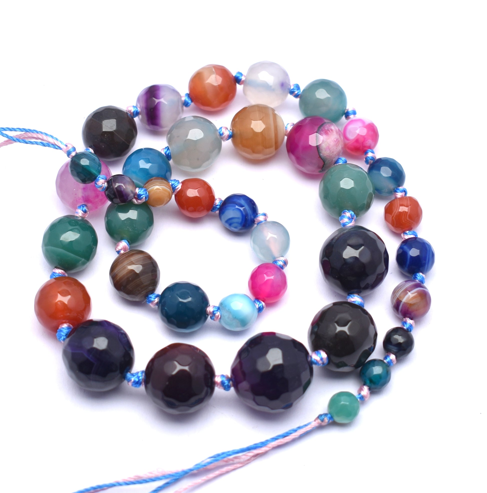 Add vibrant energy to your collection with this knotted multi-color agate bead strand (6mm to 16mm), offering a stunning array of hues.
 #AgateBeads #MultiColorJewelry #FacetedBeads #GemstoneBeads #CrystalJewelry #JewelryMaking #ColorfulBeads #HealingCrystals