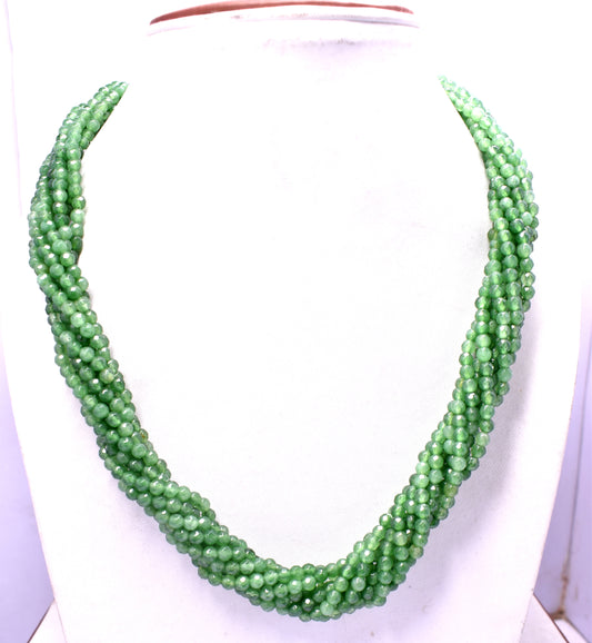 An elegant 12-line bunch necklace with faceted green jade beads, weighing 139 grams.
#GreenJade #JadeNecklace #FacetedBeads #GemstoneJewelry #ChicJewelry #LuxuryJewelry #StatementNecklace #BeadedNecklace #NaturalGemstones #ElegantStyle