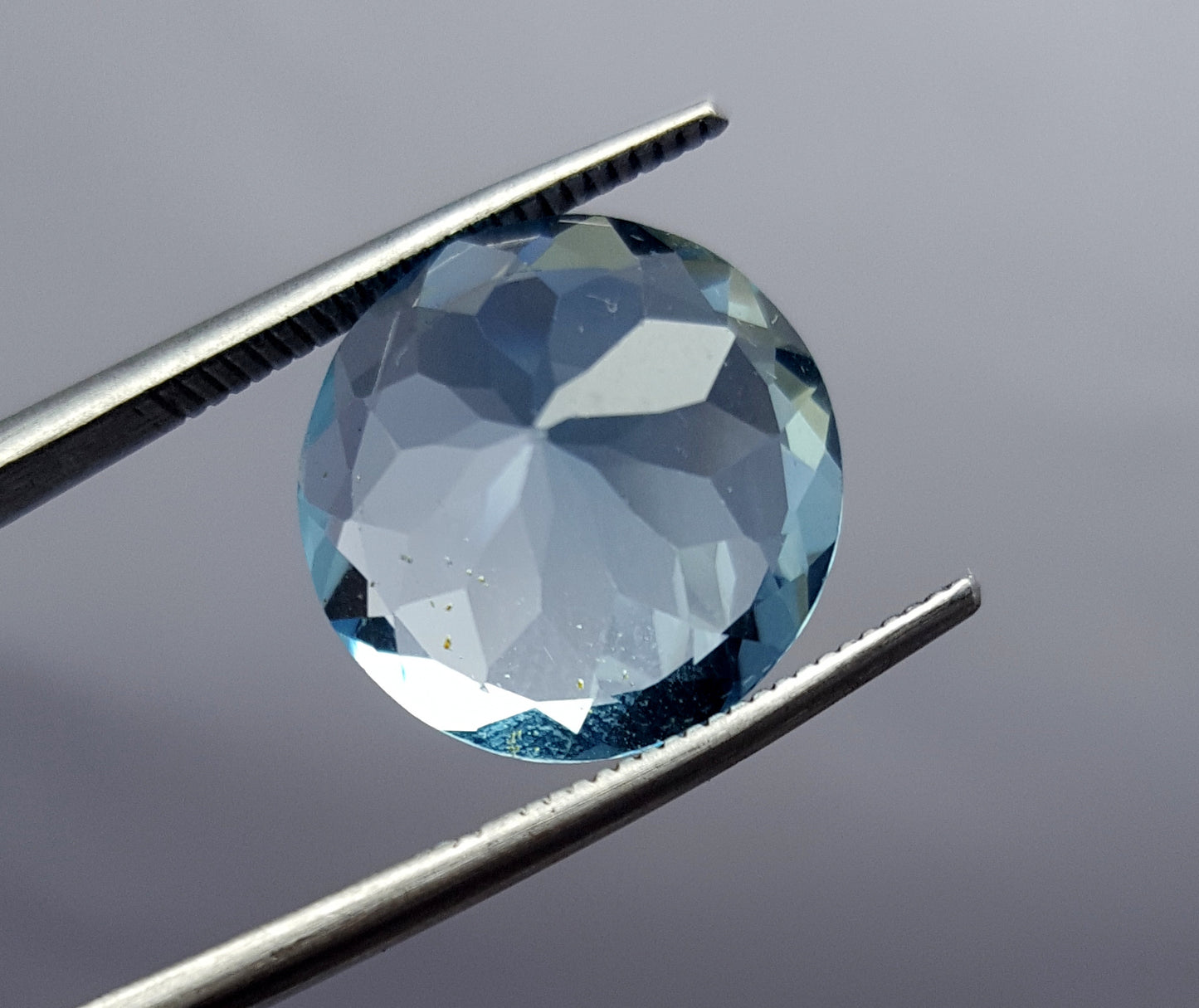 Blue Topaz round faceted gemstone, 6.50 carats, perfect for jewelry.
#BlueTopaz #LooseGemstone #FacetedGemstone #6.50Carat #TopazJewelry #NaturalTopaz #Gemstone
