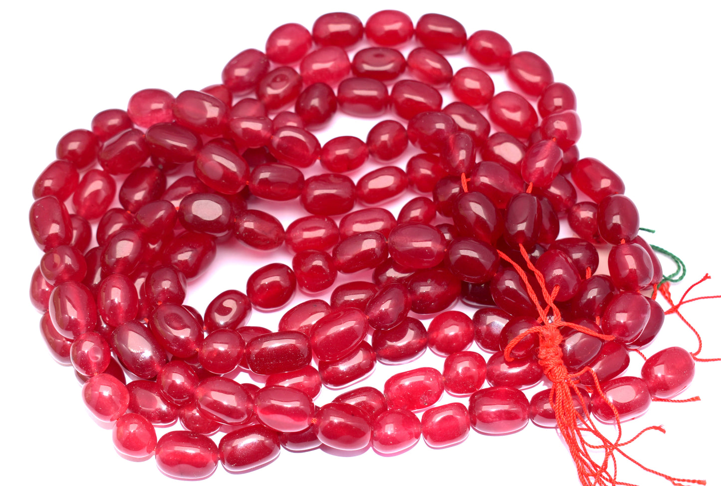 Features natural red jade tumble beads, perfect for vibrant jewelry.
#RedJade #TumbleBeads #GemstoneJewelry #HealingCrystals #JewelryMaking