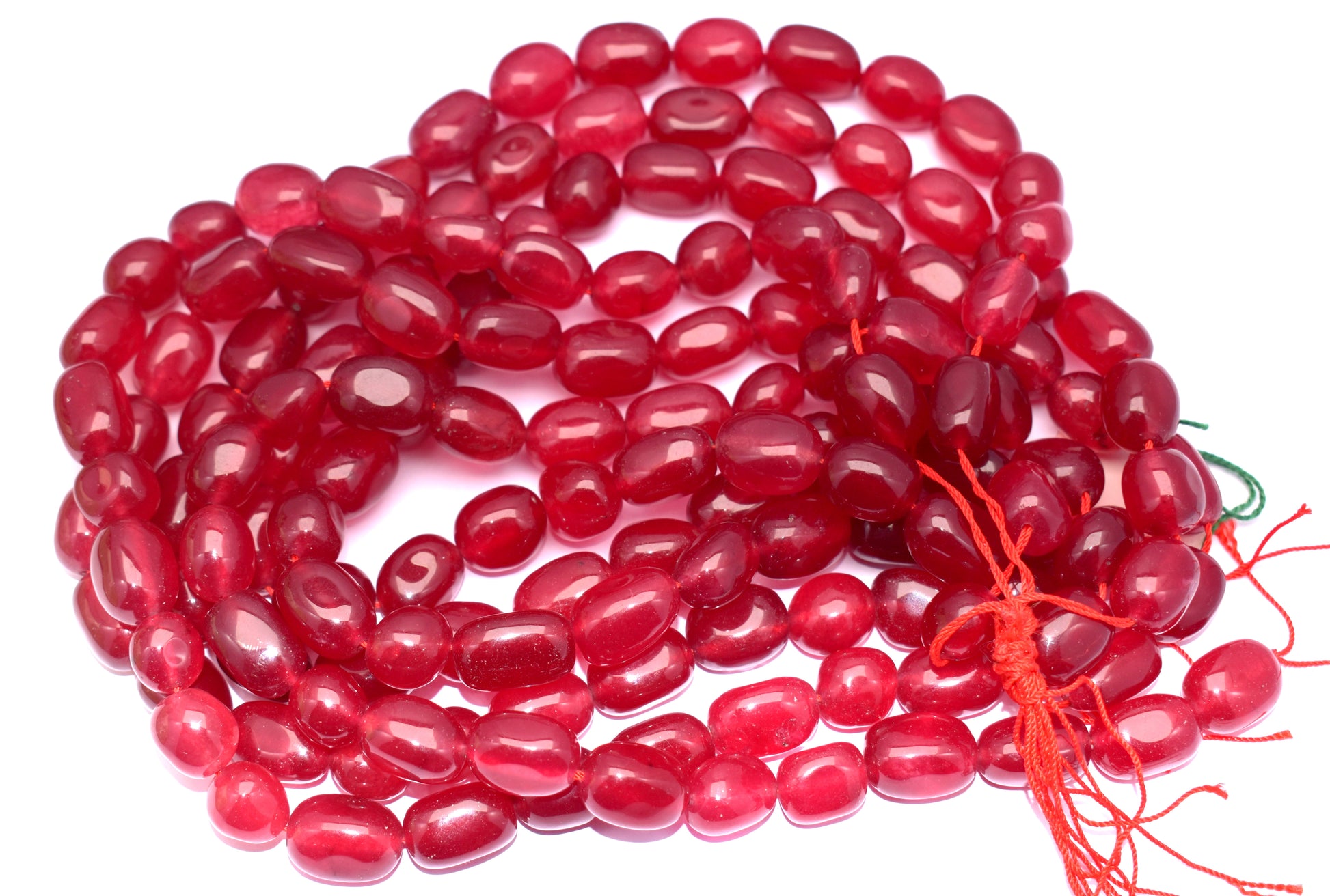 Features natural red jade tumble beads, perfect for vibrant jewelry.
#RedJade #TumbleBeads #GemstoneJewelry #HealingCrystals #JewelryMaking