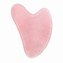Natural Rose Quartz Gua Sha for facial massage, skin rejuvenation, and emotional healing #RoseQuartzGuaSha #FacialMassage #SkinRejuvenation #EmotionalHealing #HealingCrystals #SelfCare #RoseQuartz #CrystalHealing #GuaShaMassage #BeautyTools #NaturalHealing #HolisticSkincare #PositiveEnergy #SelfLove