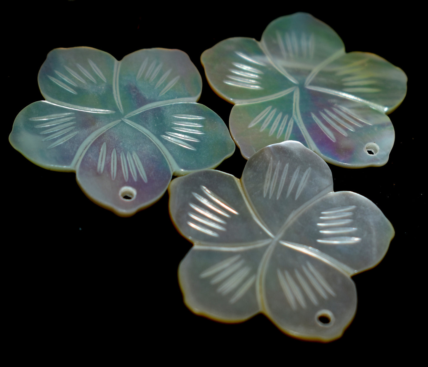 Pearl Shell Flower Carving - Intricate and beautiful flower carvings made from natural pearl shells, perfect for decoration and spiritual purposes. #PearlShellCarving #FlowerCarving #ShellArt #NaturalPearl #DecorativeArt #SpiritualDecor #HandcraftedArt #ShellCrafts #UniqueJewelry #OceanInspired