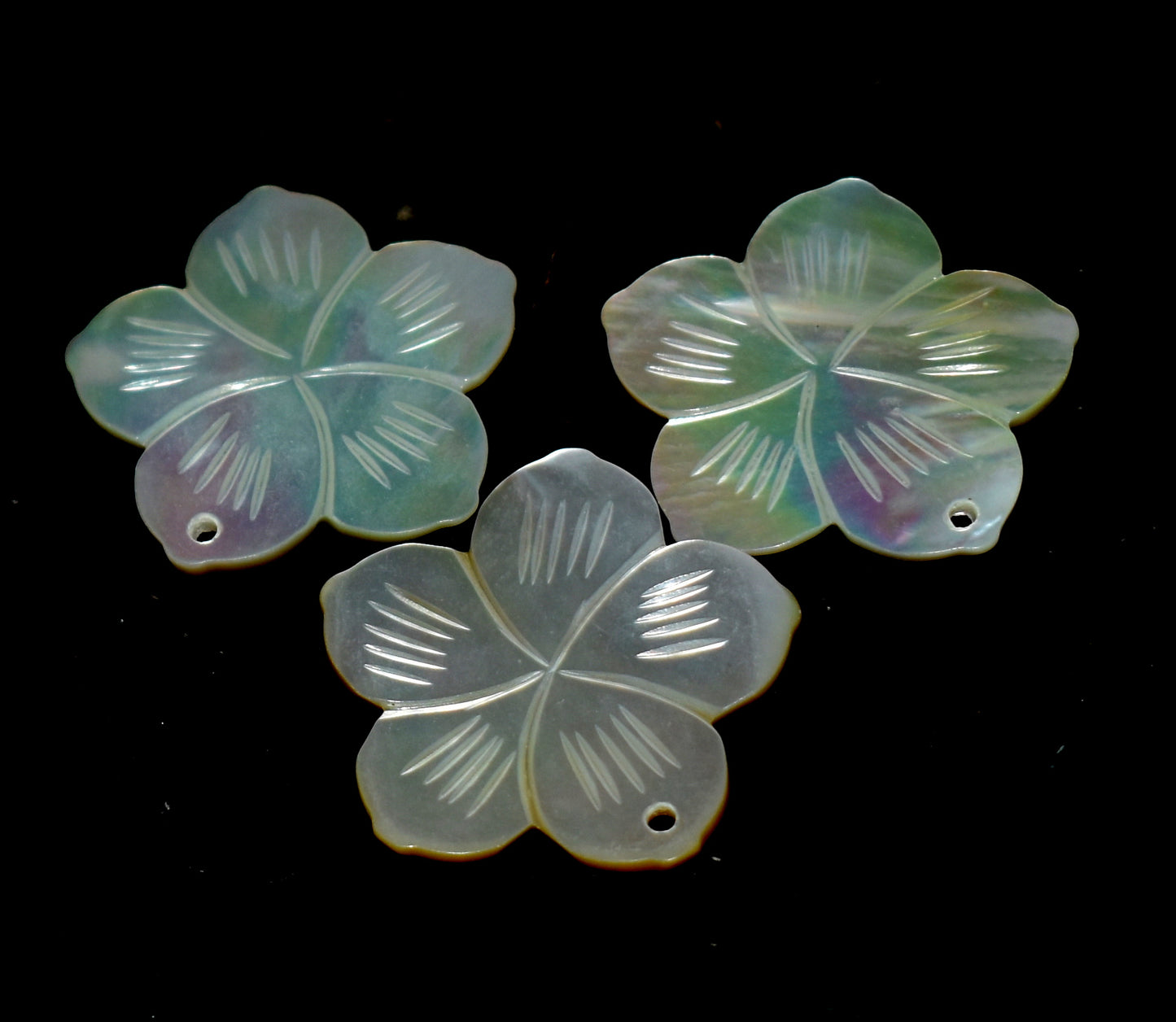 Pearl Shell Flower Carving - Intricate and beautiful flower carvings made from natural pearl shells, perfect for decoration and spiritual purposes. #PearlShellCarving #FlowerCarving #ShellArt #NaturalPearl #DecorativeArt #SpiritualDecor #HandcraftedArt #ShellCrafts #UniqueJewelry #OceanInspired