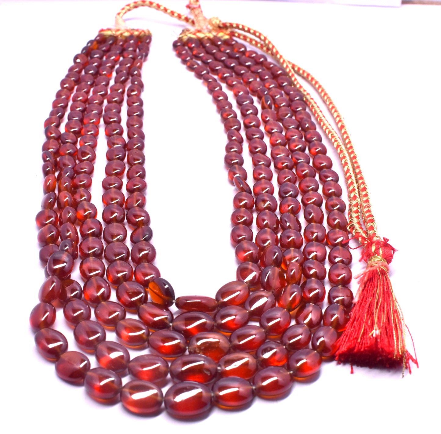 This Natural Hessonite Mani Bead Necklace features beads (6.5x8.5mm to 10x13mm), known for their healing benefits.
#HessoniteNecklace #GomedBeads #HealingCrystals #GemstoneJewelry #ManiBeadNecklace #NaturalGemstones #EnergyHealing