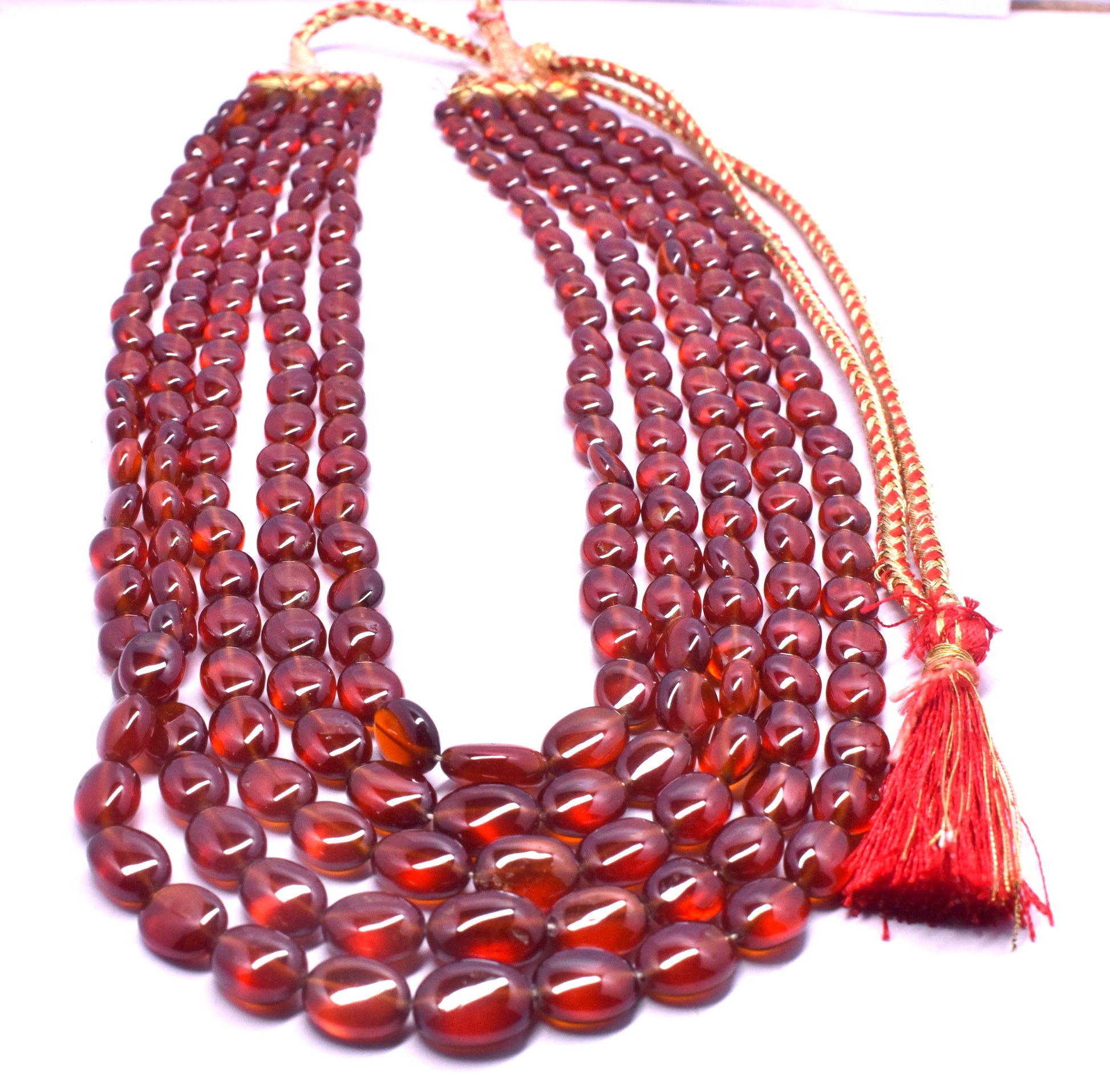 This Natural Hessonite Mani Bead Necklace features beads (6.5x8.5mm to 10x13mm), known for their healing benefits.
#HessoniteNecklace #GomedBeads #HealingCrystals #GemstoneJewelry #ManiBeadNecklace #NaturalGemstones #EnergyHealing