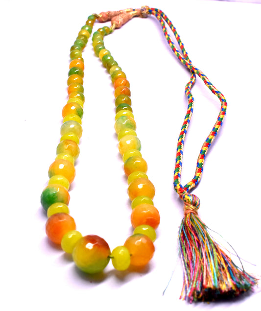 This Onyx necklace features round faceted beads (6mm to 15.5mm) with a stylish tassel. #OnyxNecklace #FacetedBeads #TasselNecklace #GemstoneJewelry #ElegantJewelry #FashionJewelry