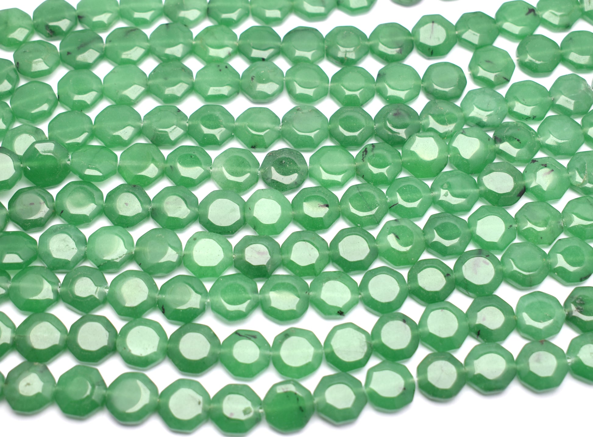 This exquisite strand features natural green jade beads (14mm), perfect for creating elegant and healing jewelry pieces.
#GreenJade #JadeBeads #GemstoneJewelry #HealingCrystals #CrystalBeads #JewelryMaking #FashionJewelry