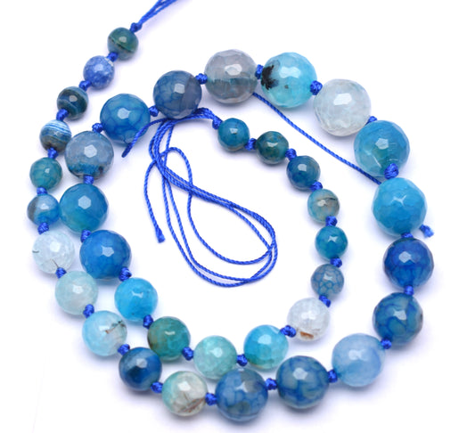 This exquisite strand of knotted, round faceted blue agate beads (8mm to 14mm) is perfect for adding serenity and style to your jewelry creations.
 #BlueAgateBeads #FacetedAgate #GemstoneStrand #HealingCrystals #CrystalJewelry #FashionJewelry #JewelryMaking #AgateJewelry
