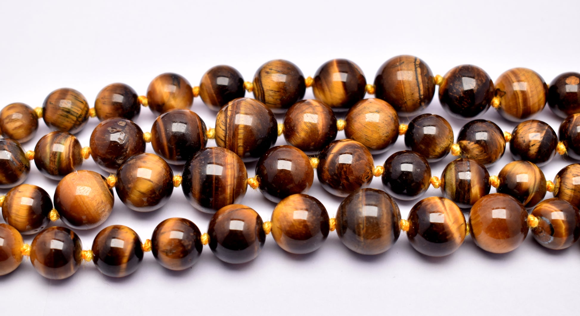 This strand features natural tiger eye round beads (6mm to 16mm), perfect for creating elegant and grounding jewelry.
#TigerEye #BeadStrand #GemstoneJewelry #HealingCrystals #JewelryMaking #CrystalBeads