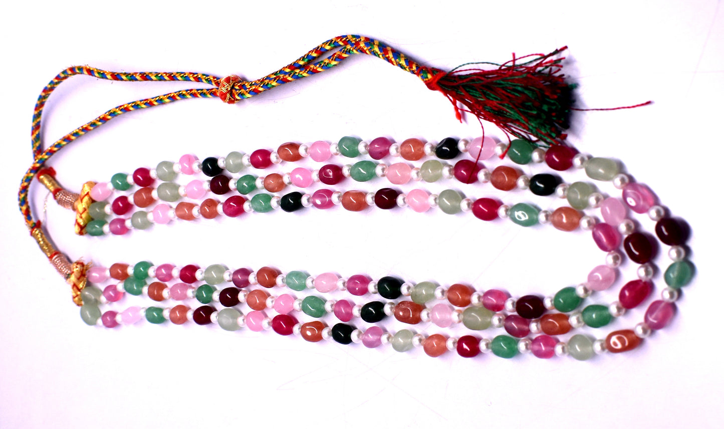 This vibrant Mani bead necklace (6.5x8mm to 7x9mm) features colorful beads and a tassel for added flair.
#ManiBeadNecklace #ColorfulJewelry #TasselNecklace #GemstoneJewelry #FashionJewelry #ElegantStyle