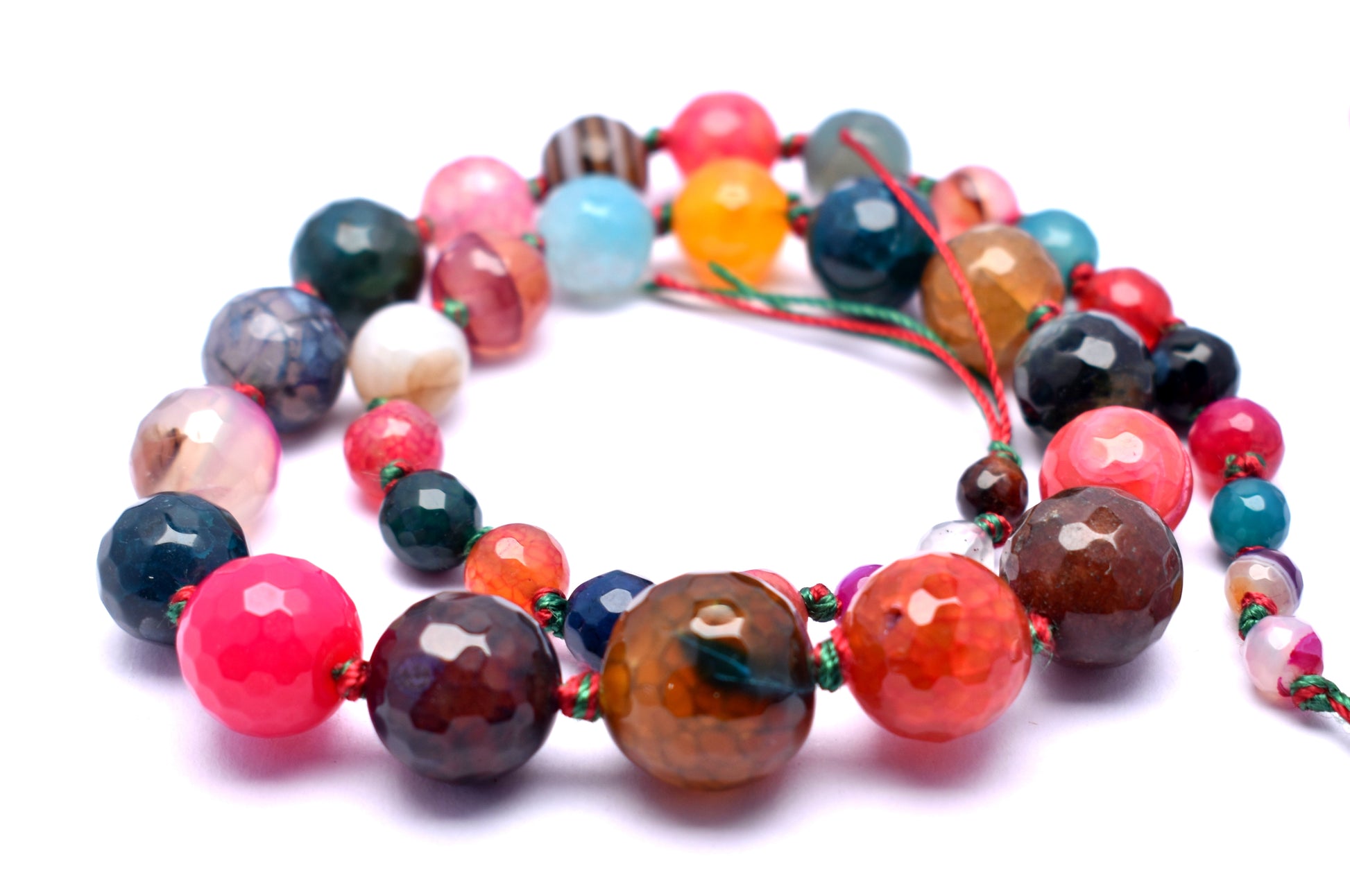This vibrant strand features knotted, round faceted multi-color agate beads (6mm to 16mm) for a colorful and stylish look.
#MultiColorAgate #AgateBeads #FacetedBeads #GemstoneJewelry #HealingCrystals #CrystalJewelry #FashionJewelry