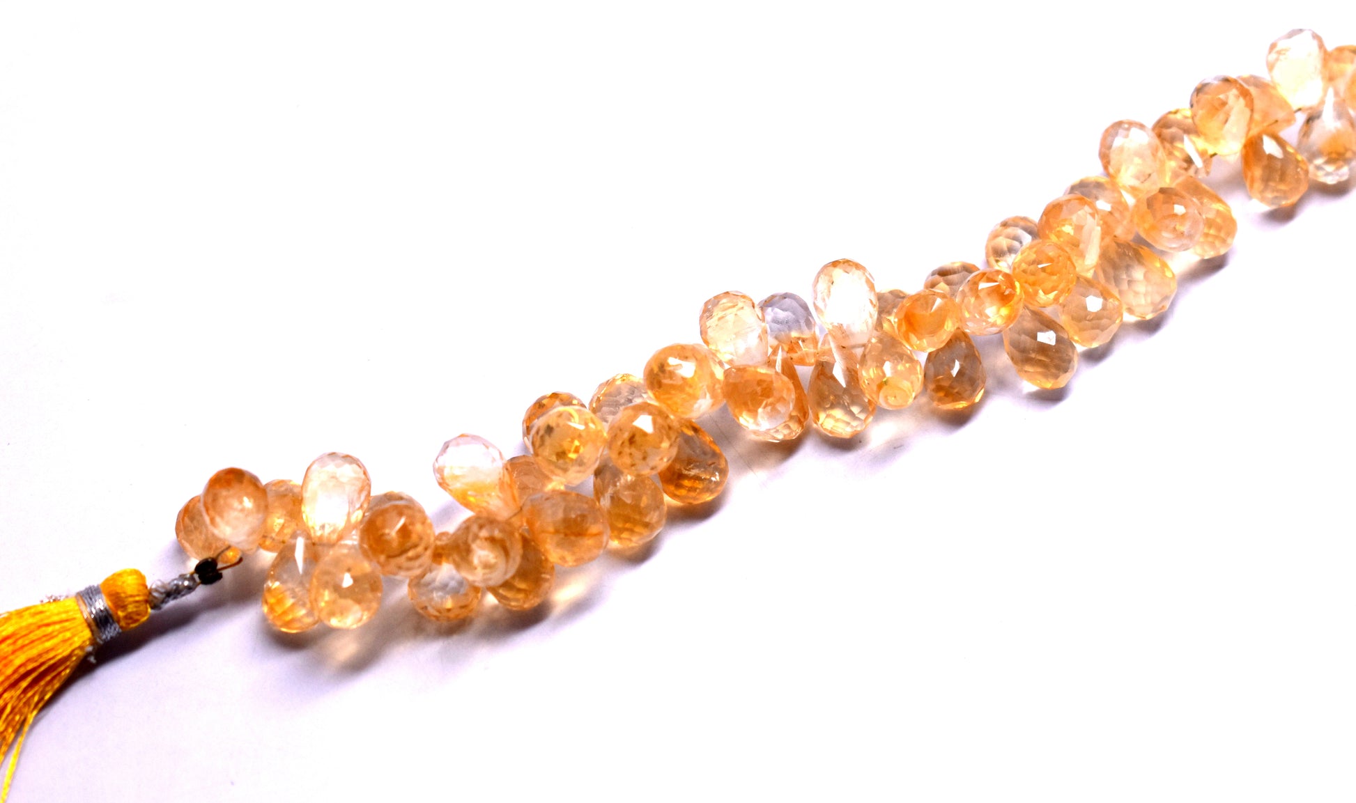 A 12-inch strand of natural Citrine drops, faceted for extra shine, ideal for creating radiant jewelry pieces with a warm, golden hue.
#Citrine #FacetedBeads #GemstoneJewelry #CitrineJewelry #BeadedDesigns #HandmadeJewelry #GoldenGlow #JewelryMaking #CustomJewelry #NaturalGems






