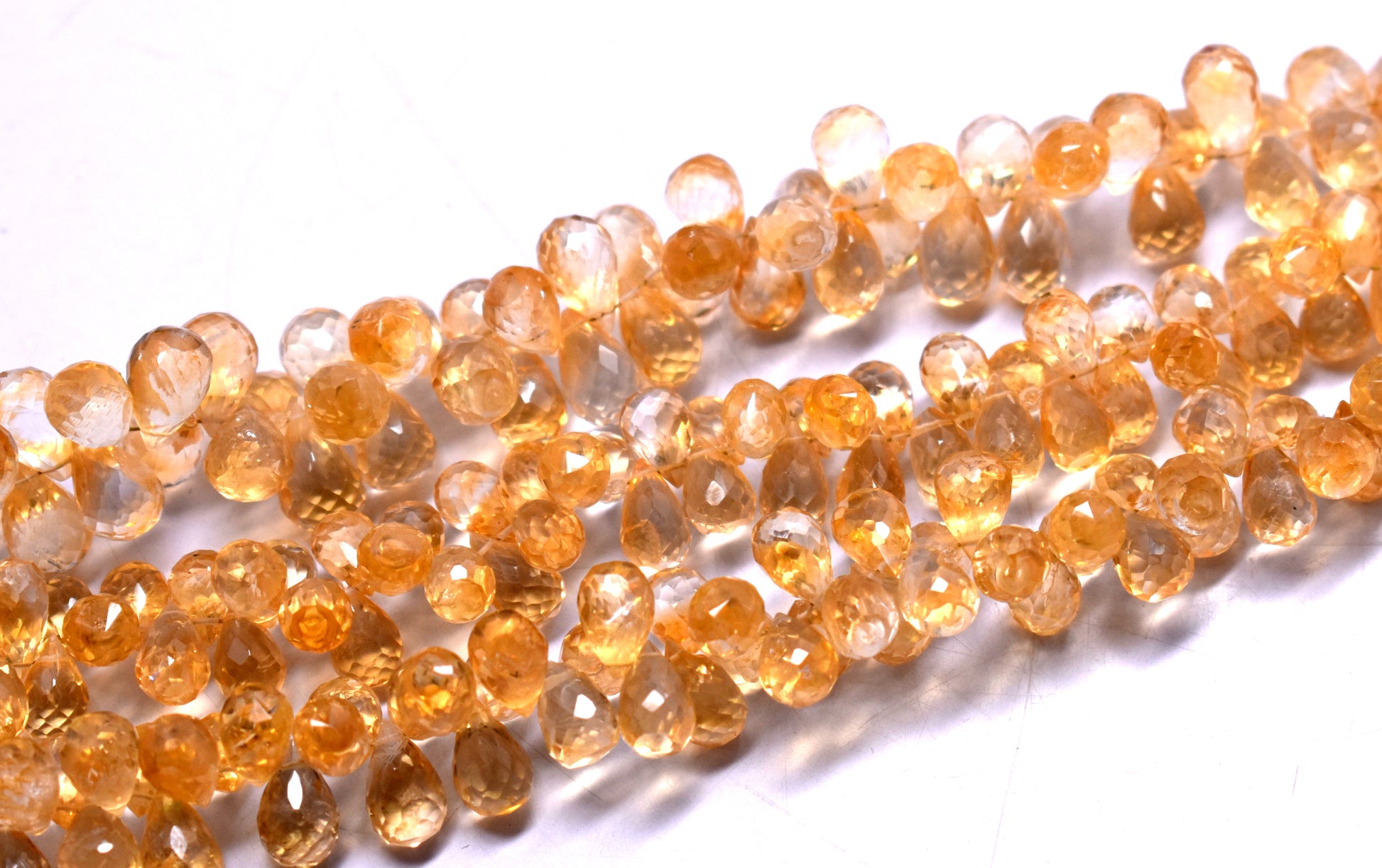 A 12-inch strand of natural Citrine drops, faceted for extra shine, ideal for creating radiant jewelry pieces with a warm, golden hue.
#Citrine #FacetedBeads #GemstoneJewelry #CitrineJewelry #BeadedDesigns #HandmadeJewelry #GoldenGlow #JewelryMaking #CustomJewelry #NaturalGems







