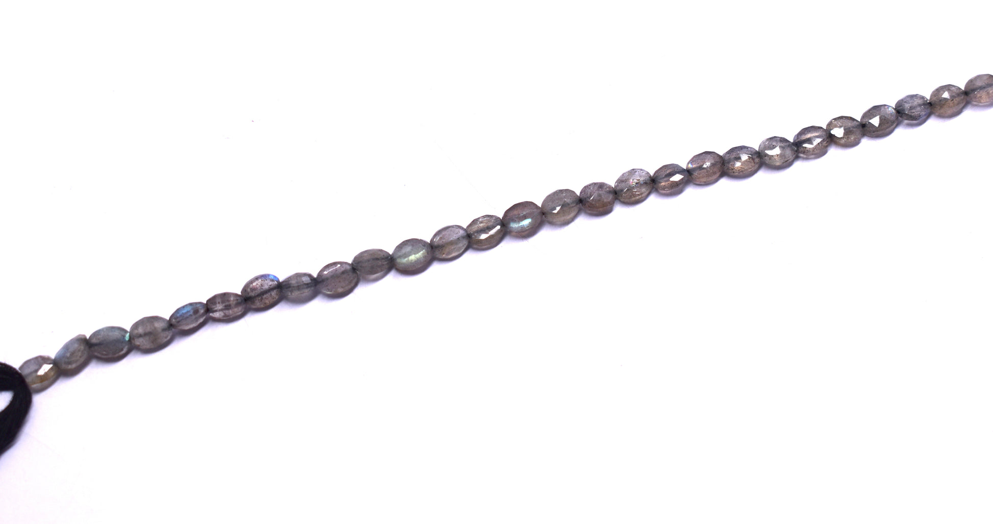 A 13-inch strand of natural Labradorite oval faceted beads, known for their stunning iridescence and mystical glow, perfect for unique jewelry creations.
#Labradorite #OvalBeads #FacetedBeads #GemstoneJewelry #JewelryMaking #NaturalGemstones #BeadedJewelry #CustomJewelry #MysticalDesigns #LuxuryJewelry