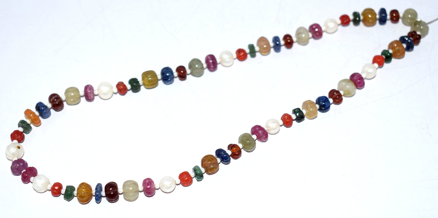 A single line of exquisite Navratan melon-shaped curved beads, weighing 115.75 carats.
#NavratanBeads #MelonBeads #GemstoneJewelry #LuxuryJewelry #ElegantStyle #StatementJewelry #NaturalGemstones #UniqueDesign #ChicJewelry






