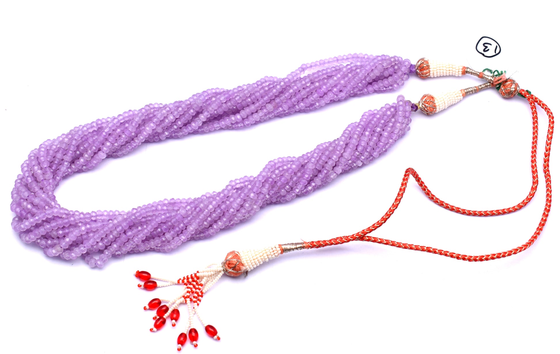 An elegant 11-line bunch necklace made from faceted purple jade beads, weighing 132 grams.
#PurpleJade #JadeNecklace #GemstoneJewelry #FacetedBeads #ChicJewelry #BoldNecklace







