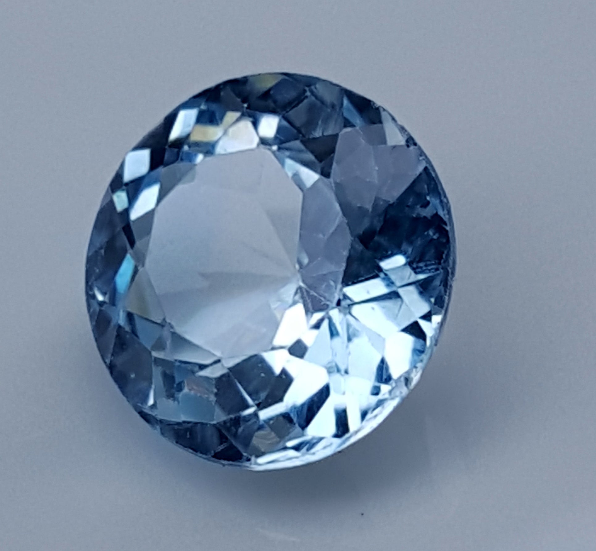 Blue Topaz round faceted gemstone, 9.00 carats, perfect for jewelry design.
#BlueTopaz #LooseGemstone #9CaratTopaz #FacetedGemstone #NaturalTopaz #JewelryMaking #TopazGemstone