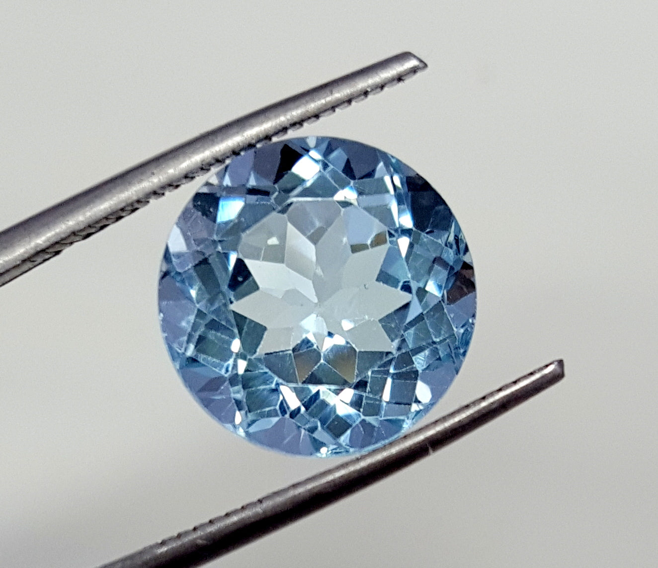 Natural Blue Topaz round faceted loose gemstone, 6.50 carats, perfect for custom jewelry.
#BlueTopazGemstone #RoundFacetedGemstone #LooseGemstone #6.50CaratGemstone #TopazGemstone #JewelryMaking #CalibratedGemstone #NaturalTopaz #LooseTopaz #PreciousGemstone
