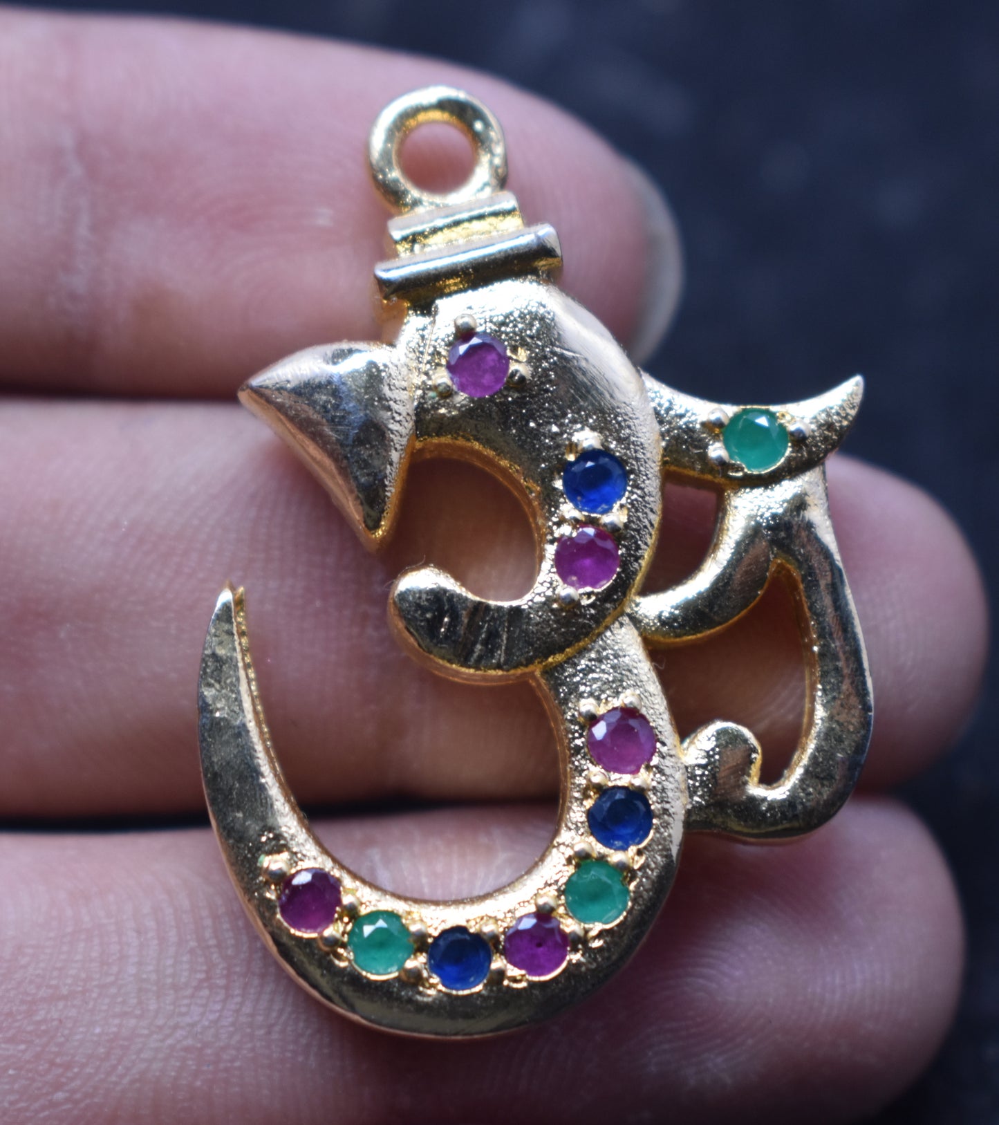 OM Gold Plated Stone Pendant Multi Color For Women, Girls, Boys, and Men – Elegant gold-plated pendant with vibrant multi-colored stones. #OMPendant #GoldPlatedJewelry #MultiColorPendant #UnisexJewelry #SpiritualJewelry