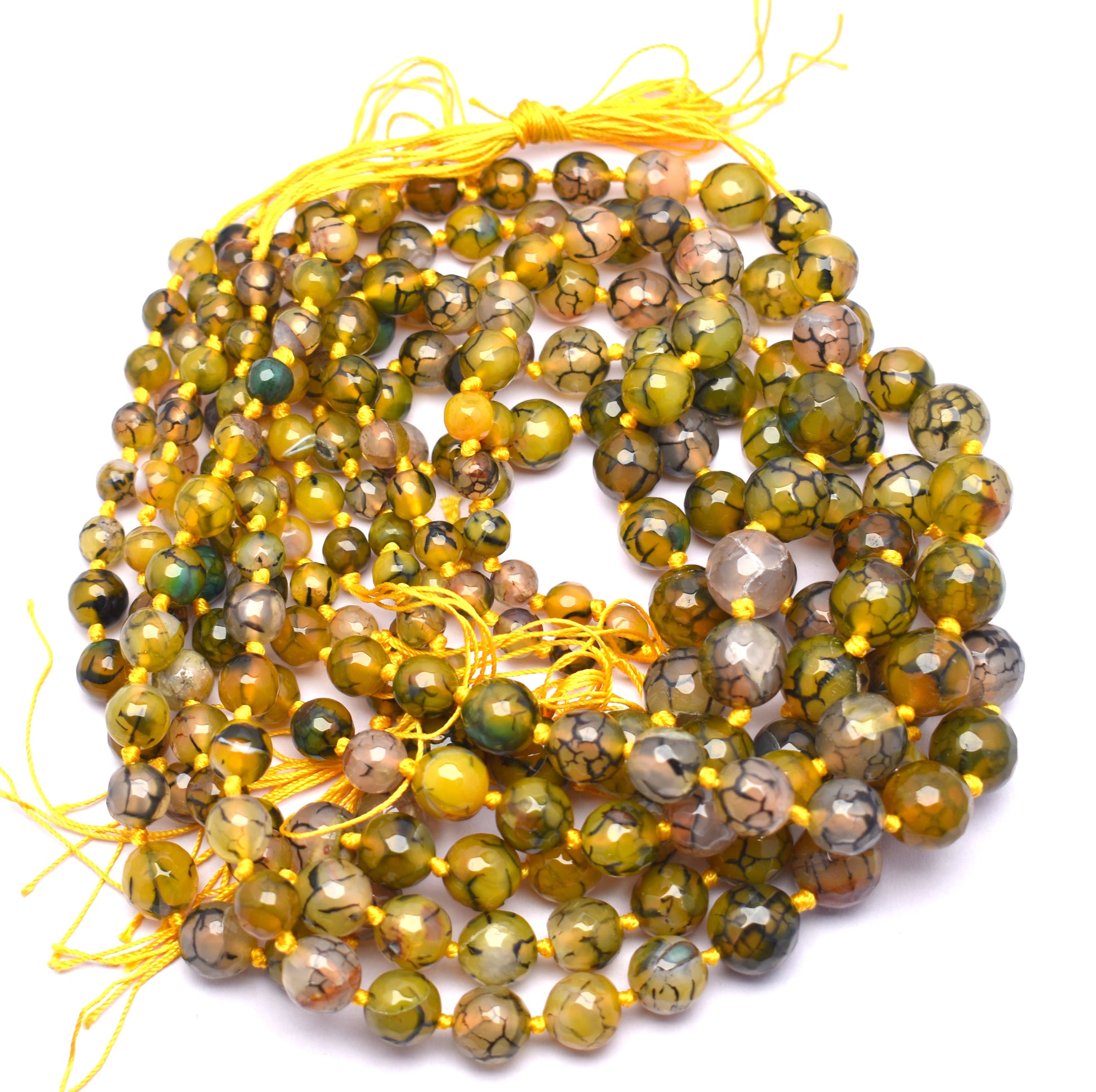 This beautiful strand features knotted, round faceted yellow agate beads (8mm to 14mm) for a vibrant and elegant look.
 #YellowAgate #AgateBeads #FacetedBeads #GemstoneJewelry #CrystalJewelry #HealingCrystals #FashionJewelry #JewelryMaking

