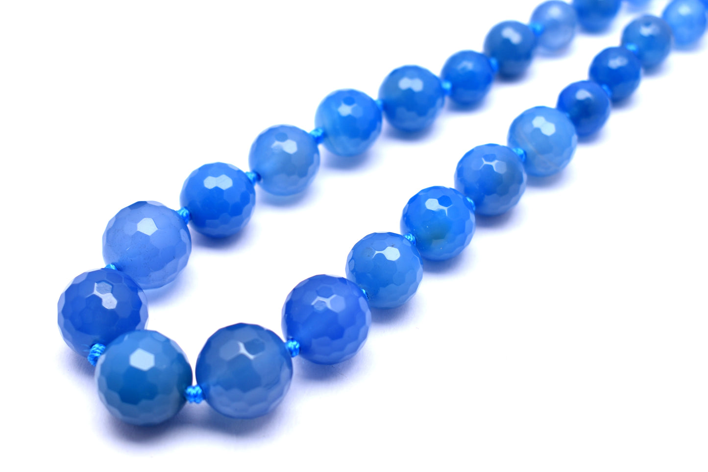 This elegant strand features natural blue onyx round faceted beads (6mm to 16mm), perfect for adding a touch of color to your jewelry creations.
 #BlueOnyx #OnyxBeads #FacetedBeads #GemstoneJewelry #HealingCrystals #FashionJewelry #CrystalBeads #JewelryMaking
