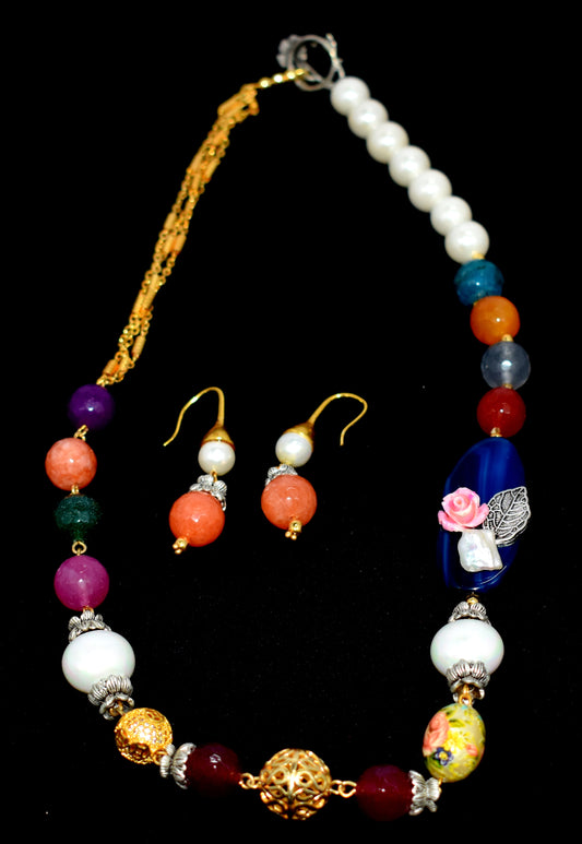 This set features multi-color stones and pearl faceted beads (10mm-11.5mm), with a 19" necklace and lock closure.
 #MultiColorStoneSet #PearlNecklace #GemstoneJewelry #FacetedBeads #ElegantJewelry #HealingCrystals






